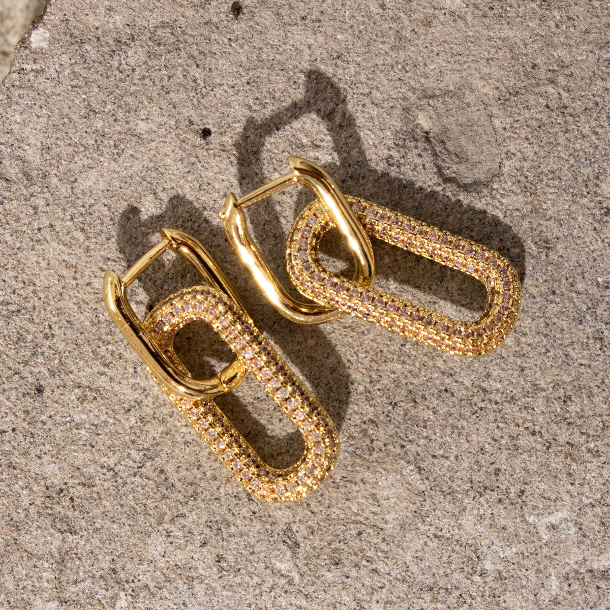Queen of the Foxes gold-plated Madison Earrings with zirconia-set rectangular drops suspended from small hoops.